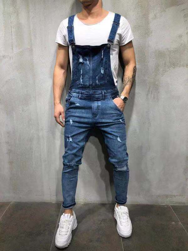 Herre overall i moderne urban stil med stilfulde ødelæggelser Stilla