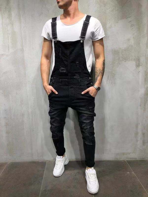 Herre overall i moderne urban stil med stilfulde ødelæggelser Stilla