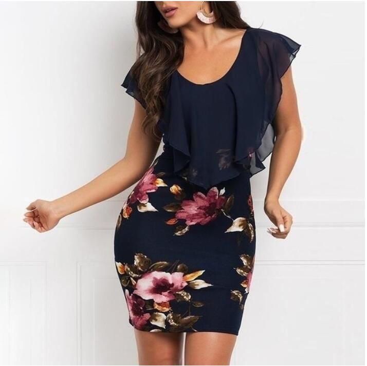 Dame elegant kjole med flydende overdel og floral design Stilla