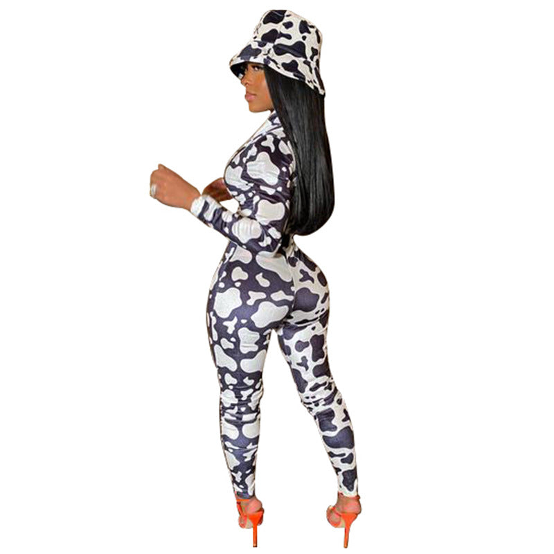 Dame figursyet jumpsuit med iøjnefaldende kuhmønster og lynlås Stilla