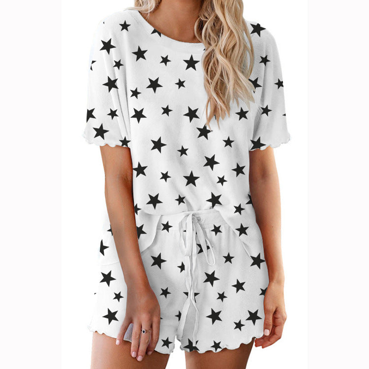 Dame jumpsuit med stjernemotiv Stilla