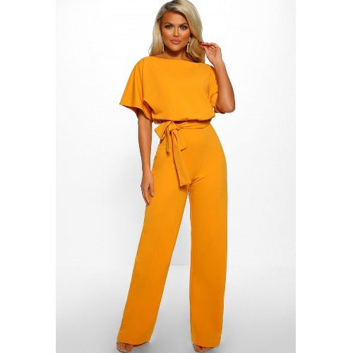 Dame bredbenet jumpsuit med stilfuld bindebælte Stilla