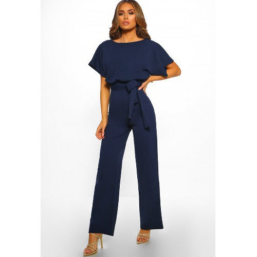 Dame bredbenet jumpsuit med stilfuld bindebælte Stilla