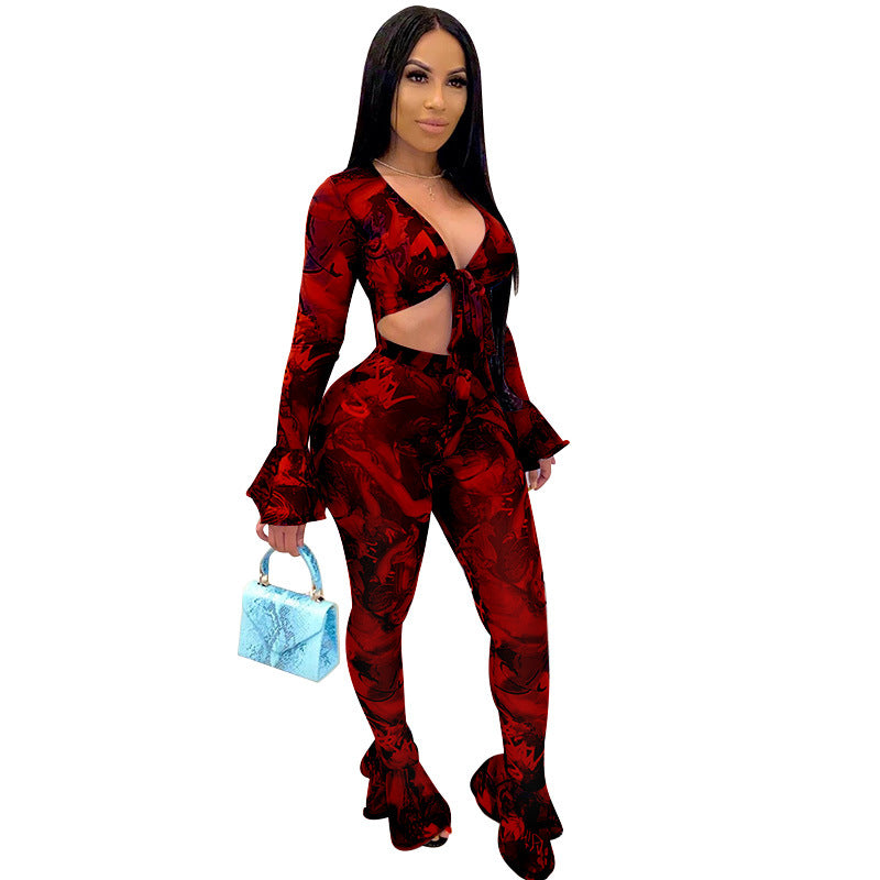 Dame Mode Cut-Out Jumpsuit med flared ærmer og farverigt Tie-Dye-design Stilla