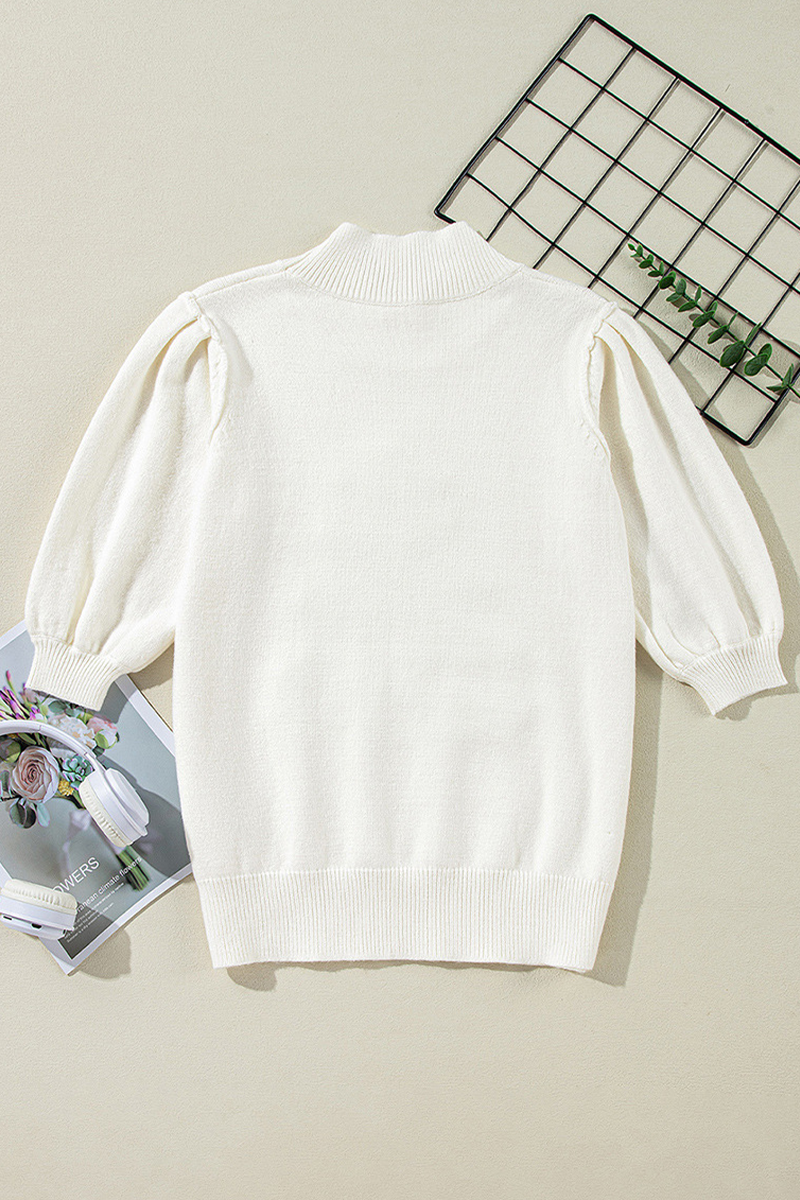 Stilla | Løs rullekrave sweater med patchwork af juletræ pailletter