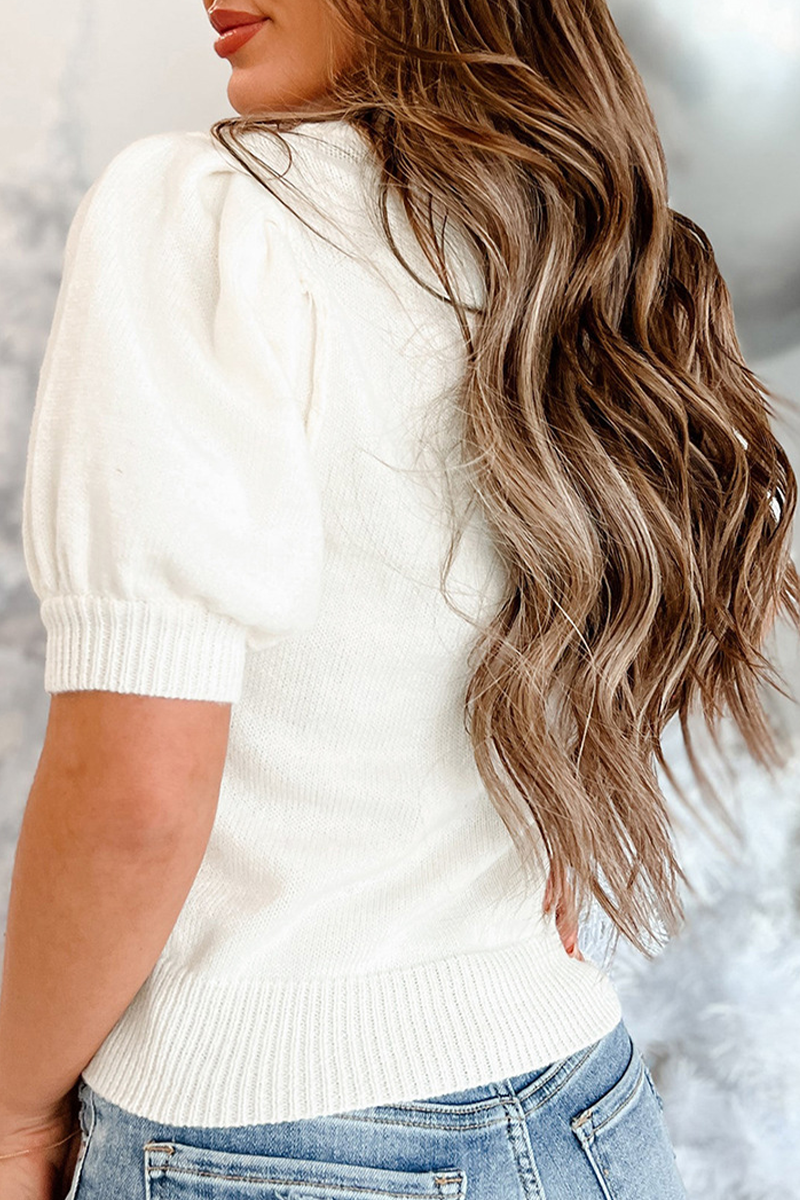 Stilla | Løs rullekrave sweater med patchwork af juletræ pailletter