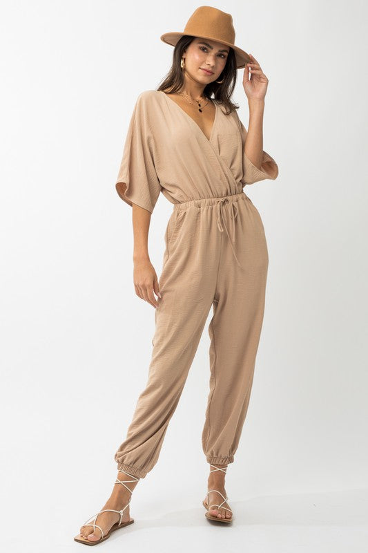 Stilla | Ærme Surplice Jumpsuit