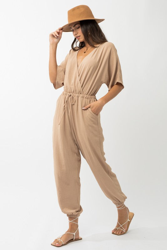 Stilla | Ærme Surplice Jumpsuit