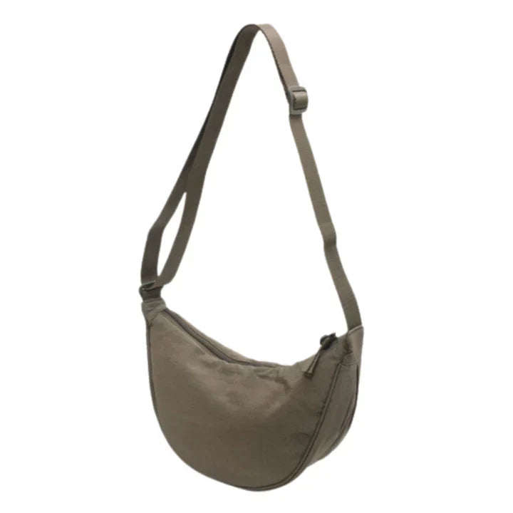 Stilla | Halvmåne crossbody taske med blomstermønster