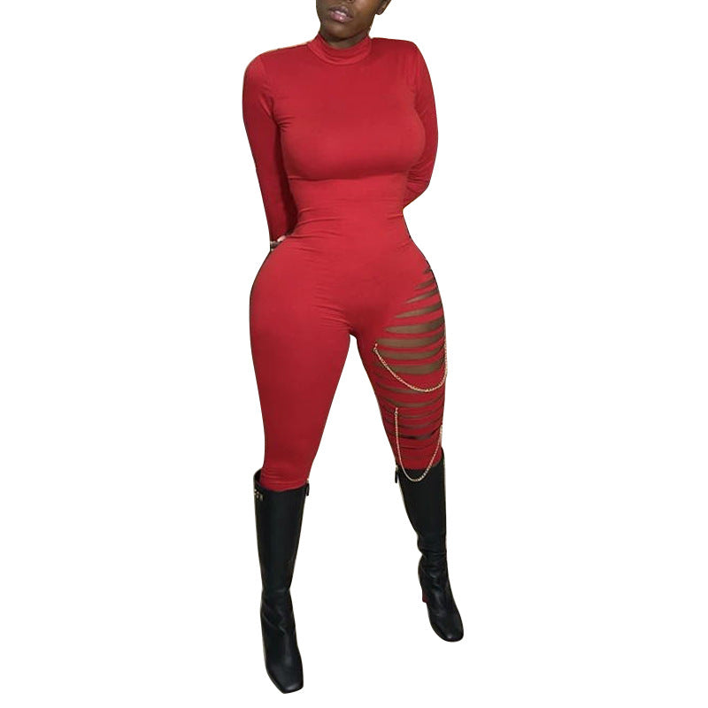 Dame figurformende jumpsuit med trendy cut-out detaljer og højhalset krave Stilla