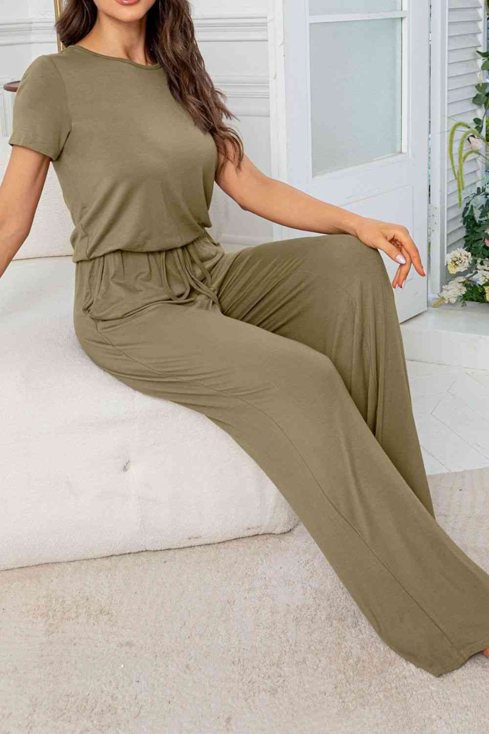 Stilla | Hals Åben Bag Jumpsuit Med Lommer