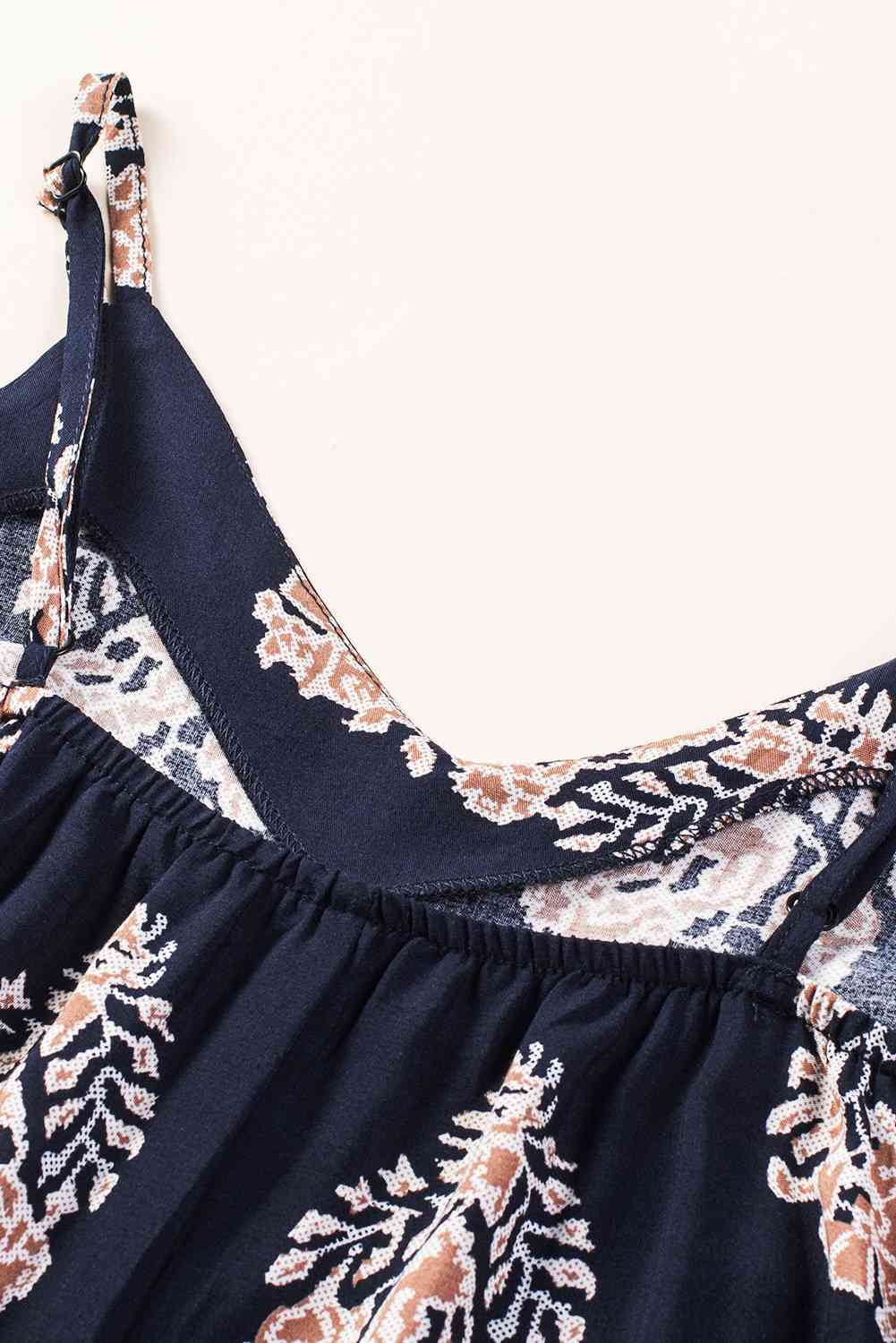 Stilla | V-hals ærmeløs jumpsuit