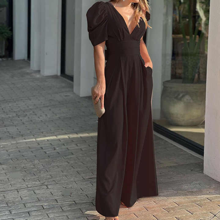 Stilla | Elegant V-udskæring Jumpsuit med puffærmer til stilfulde kvinder