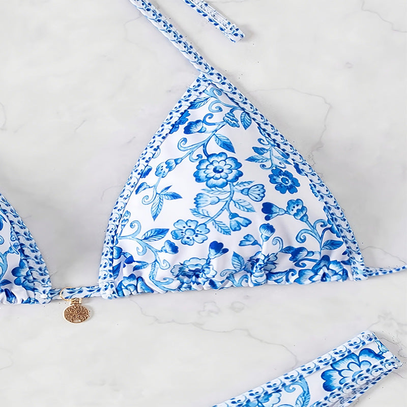 Dame triangel-bikini med blomsterdesign og elegante bindedetaljer Stilla