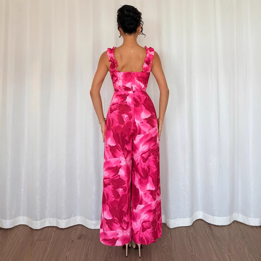 Dame jumpsuit med floral design og raffinerede flæsedetaljer Stilla