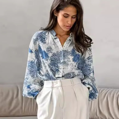 Dame skjorte bluse med floralt motiv og afslappet snit Stilla