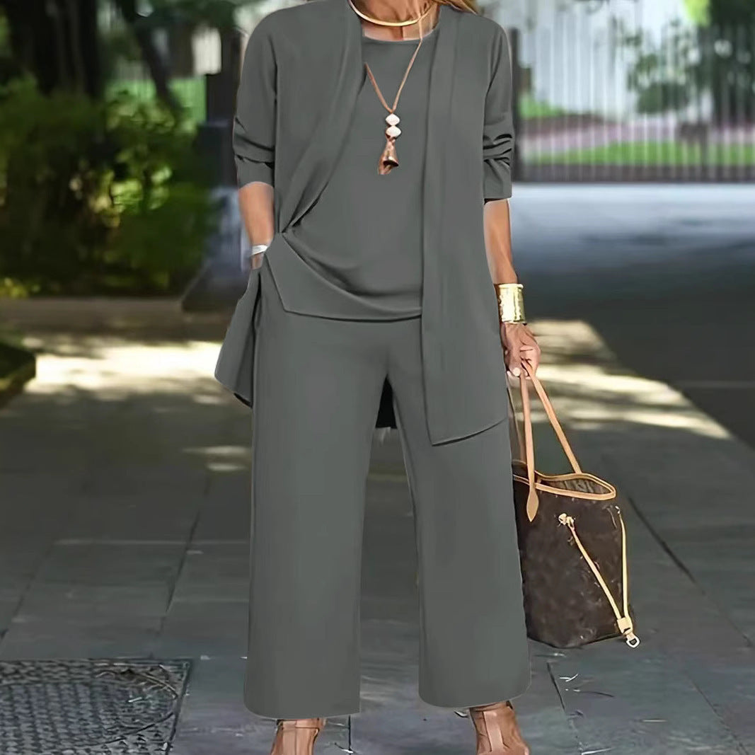 Dame Elegante og komfortabel todelt outfit med brede bukser og flydende top Stilla