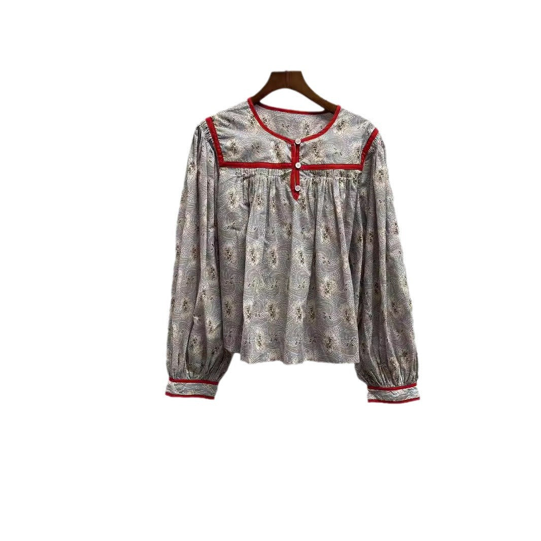 Dame afslappet bluse med blomsterprint og elegant knapliste Stilla
