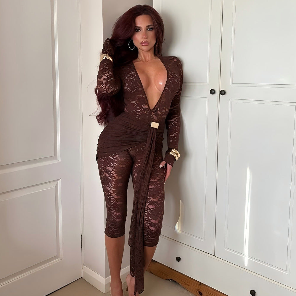 Dame sexet jumpsuit i spids med dyb V-udskæring og taljebælte Stilla