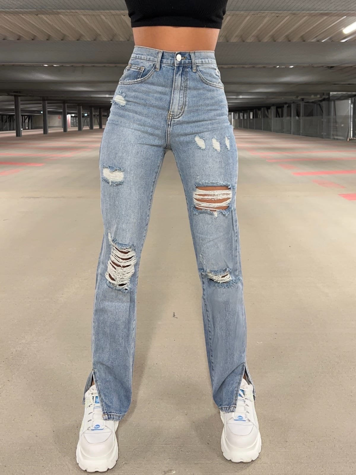 Dame Ripped Wide-Leg Jeans med asymmetrisk kant og høje detaljer Stilla