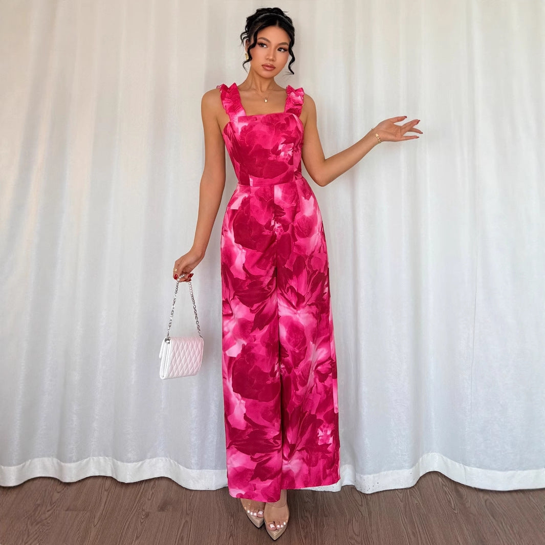 Dame jumpsuit med floral design og raffinerede flæsedetaljer Stilla
