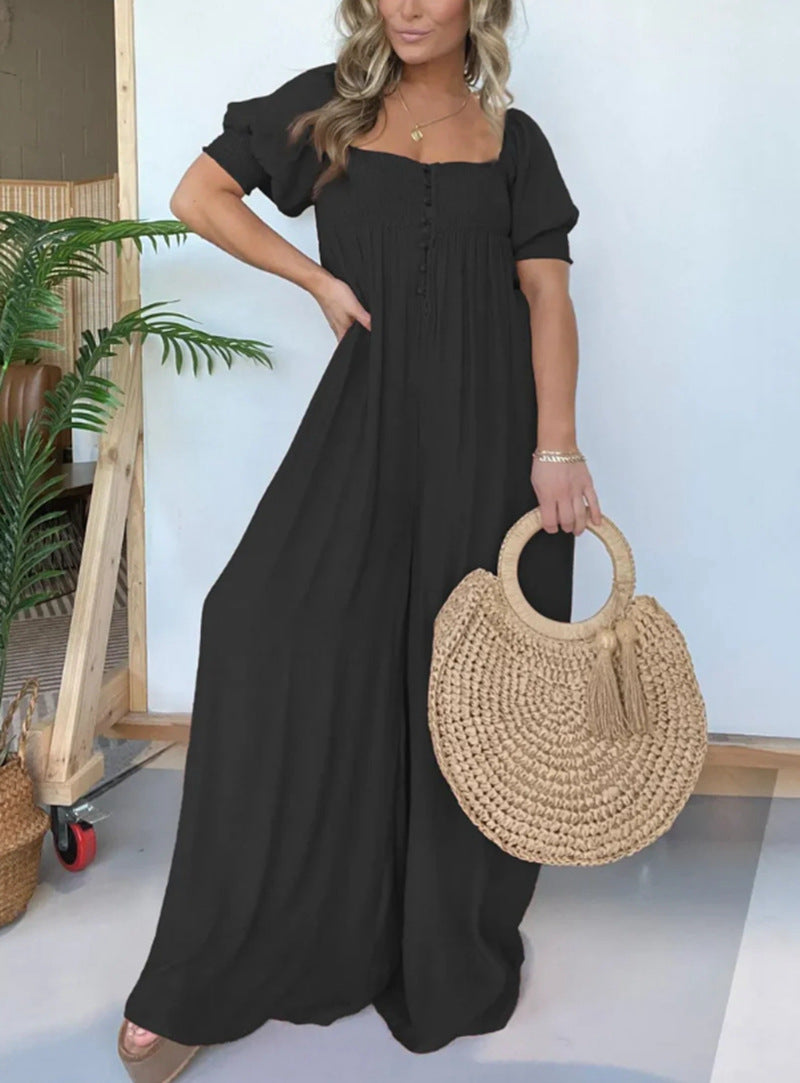 Dame afslappet jumpsuit med smalle stropper og knapdetalje Stilla