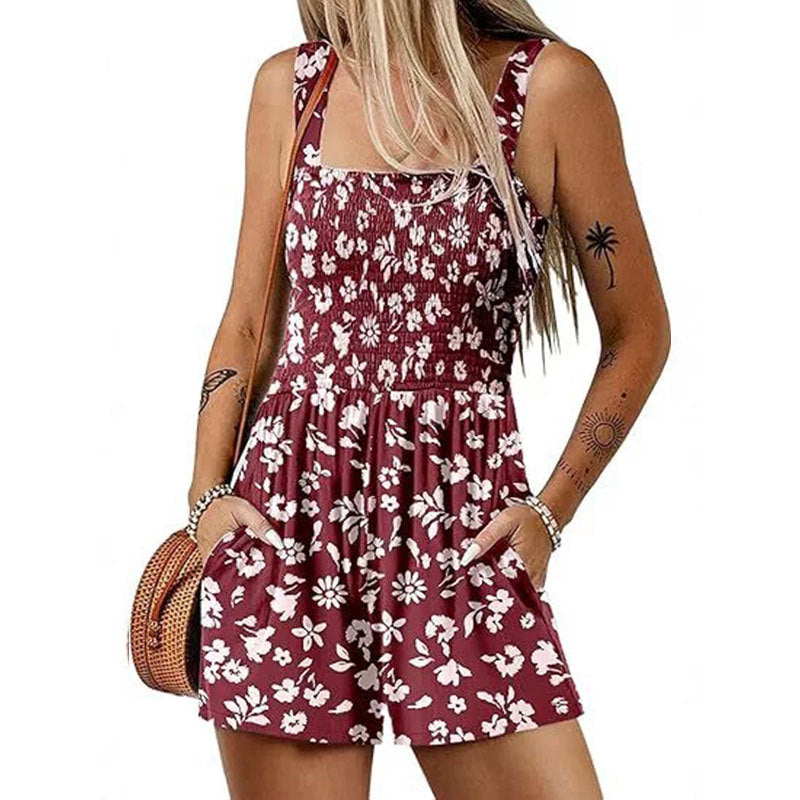 Dame jumpsuit med florale detaljer og praktiske lommer Stilla