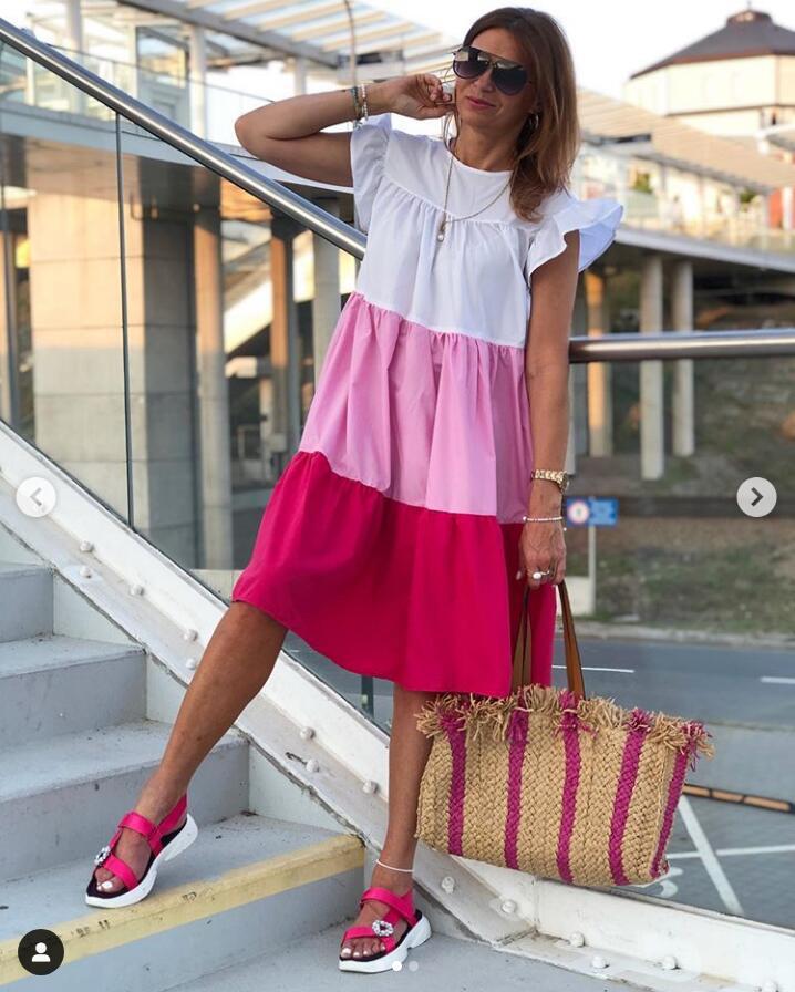 Dame afslappet langærmet kjole med flæse og asymmetrisk snit Stilla