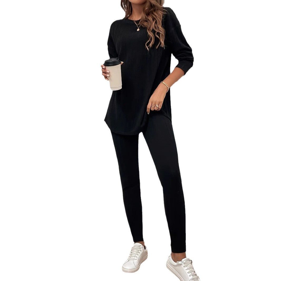 Dame afslappet langærmet top med praktisk lommefunktion og matchende leggings Stilla