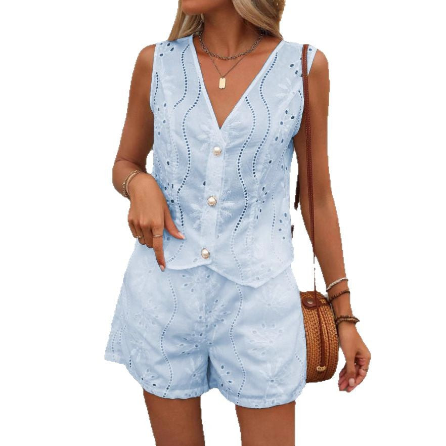 Dame kort jumpsuit med blomsterbort design og perleknapper Stilla