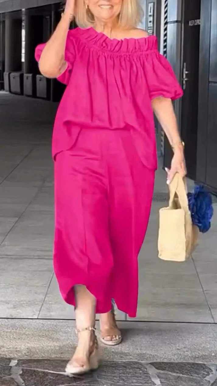 Dame luftig jumpsuit-sæt med voluminøse ærmer og raffineret taljering Stilla