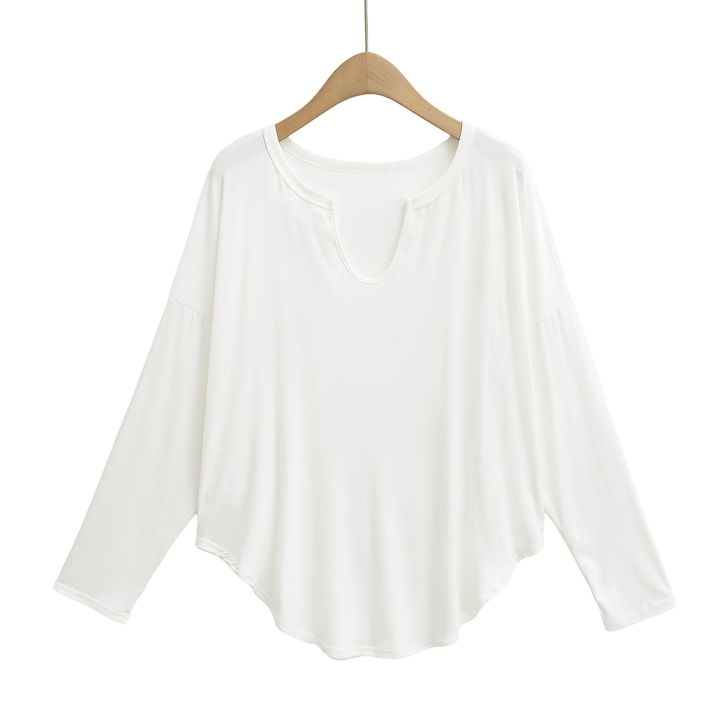 Dame afslappet longsleeve top med dyb v-hals og løstsiddende snit Stilla