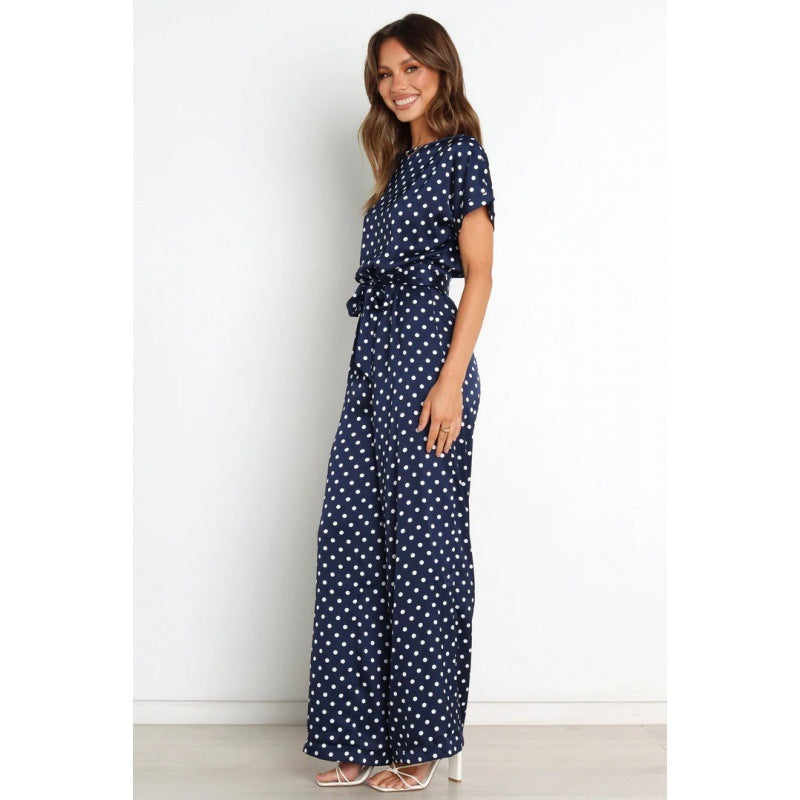 Dame jumpsuit med vidde bukseben og elegant bindebælte Stilla