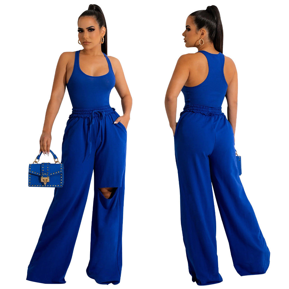 Dame Sporty Jumpsuit med høj talje og innovativ slidsdesign Stilla