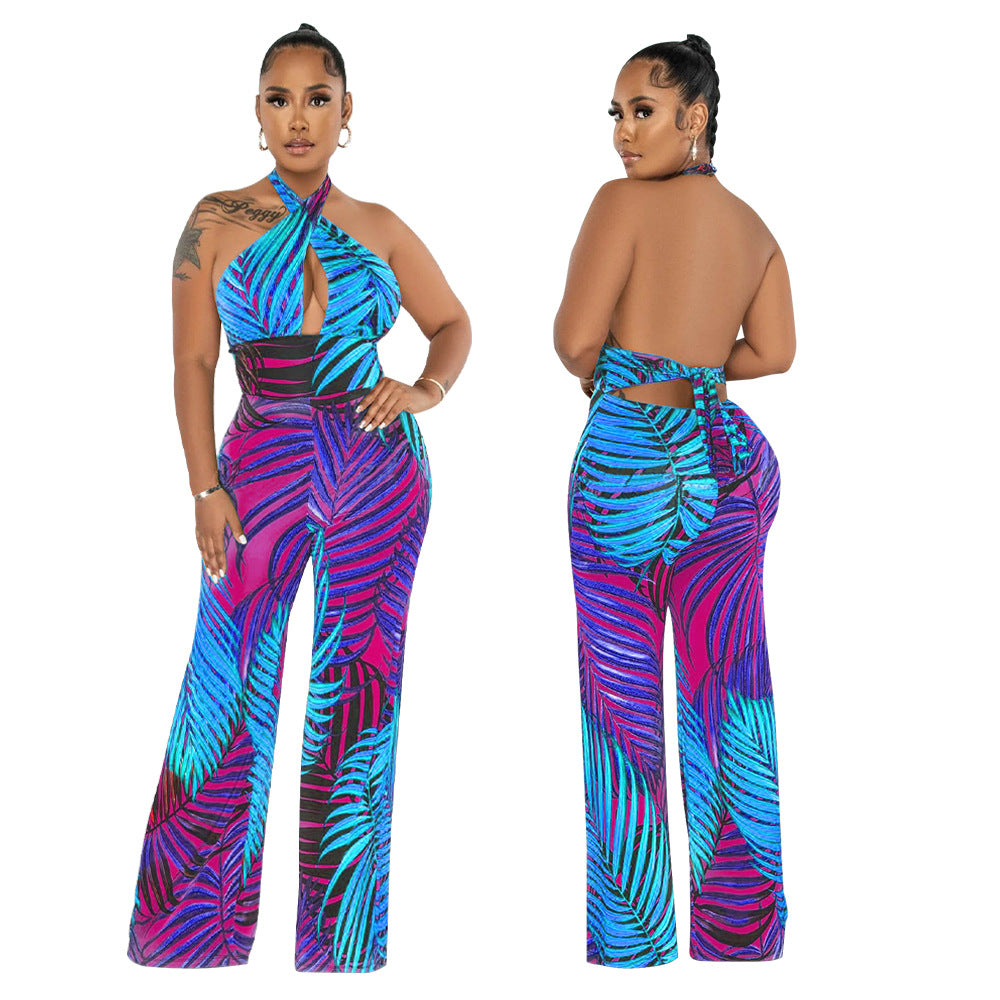 Dame elegant jumpsuit med afslappet halter-design og iøjnefaldende bladmønster Stilla