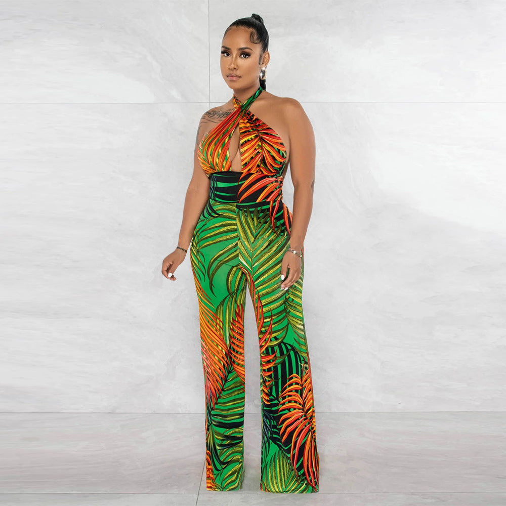 Dame elegant jumpsuit med afslappet halter-design og iøjnefaldende bladmønster Stilla
