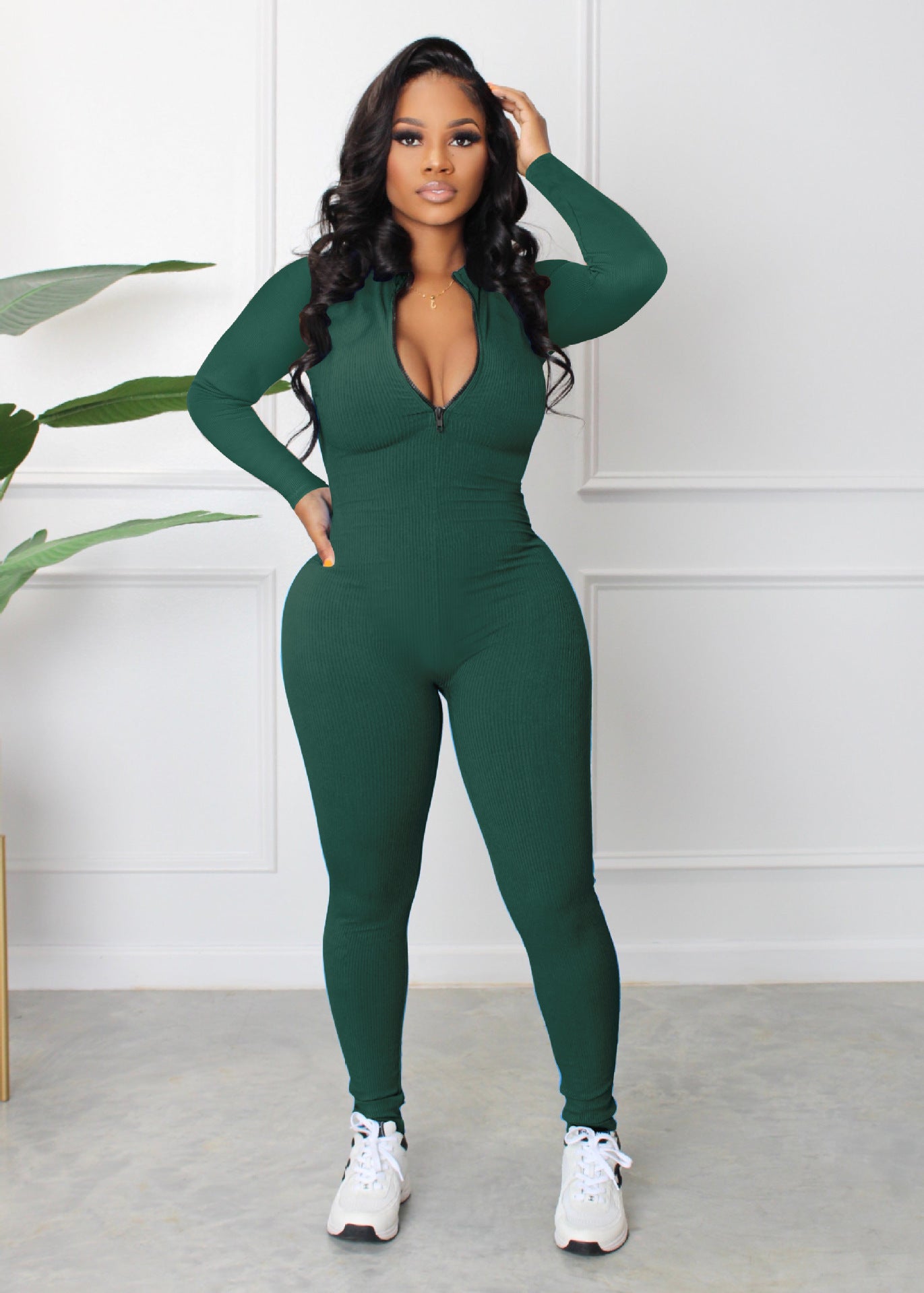 Dame sporty langærmet jumpsuit med lynlås og tætsiddende snit Stilla