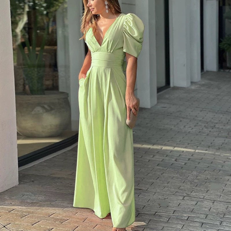 Dame jumpsuit med voluminøse ærmer og dyb v-hals Stilla