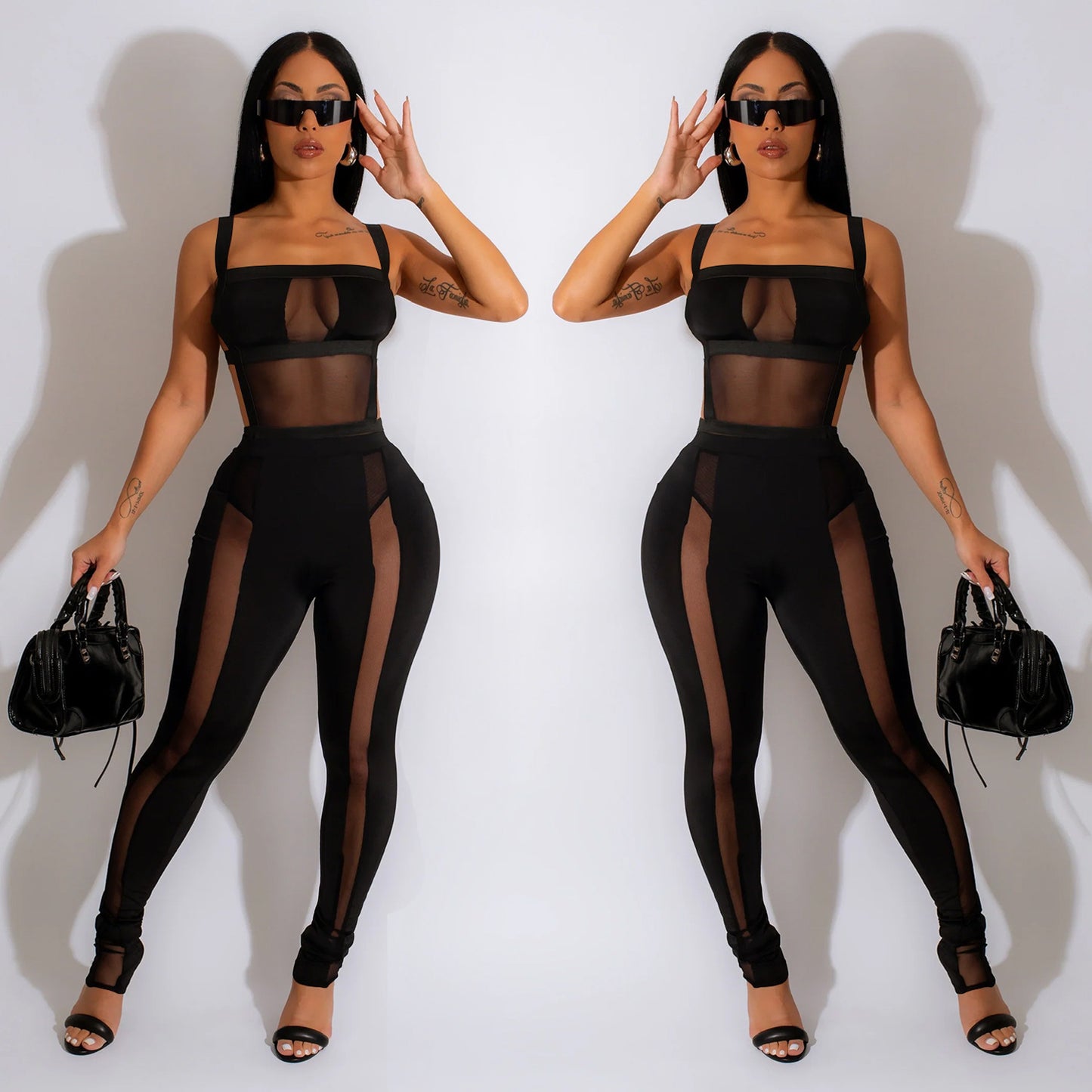 Dame figursyet jumpsuit med mesh-indsatser og høj talje Stilla