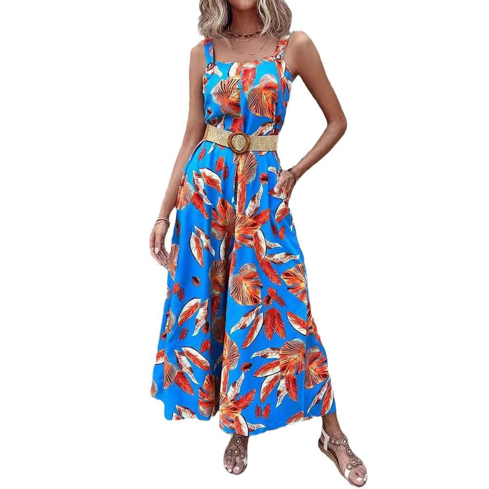Dame jumpsuit med floral design og tætsiddende bælte Stilla