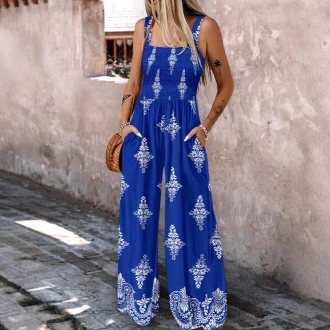 Dame luftig jumpsuit med blomstermønster og praktiske lommer Stilla