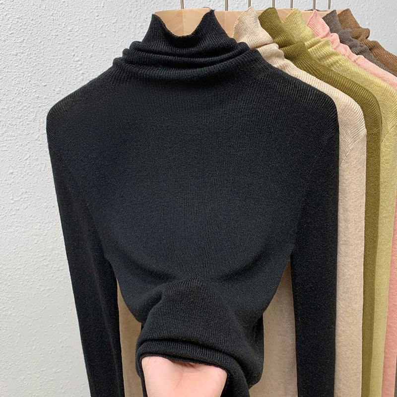 Dame rullekravepullover med fin ribstruktur og høj komfort Stilla