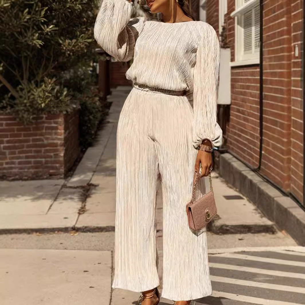 Dame Elegant plisseret jumpsuit med voluminøse ærmer og bredt ben Stilla