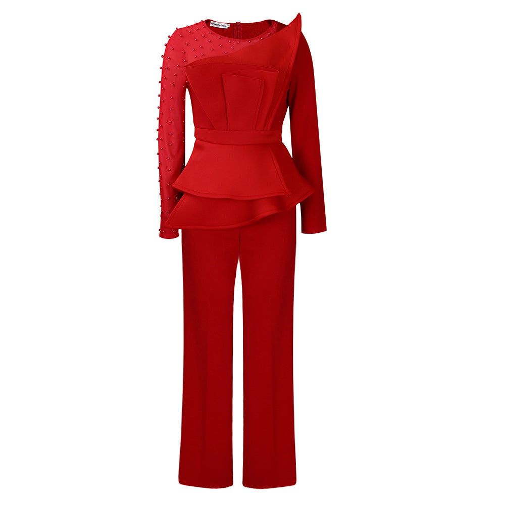 Dame Elegant Jumpsuit med asymmetrisk design og voluminøs peplum Stilla