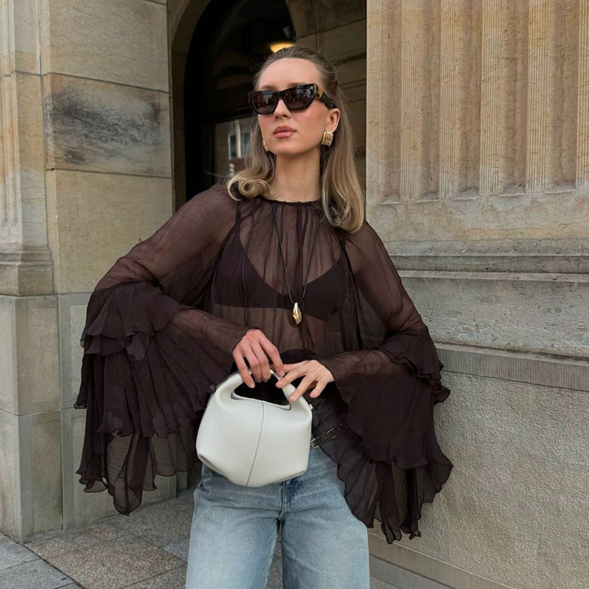 Dame Transparent Bluse med voluminøse flæsedetaljer og stilfuldt design Stilla