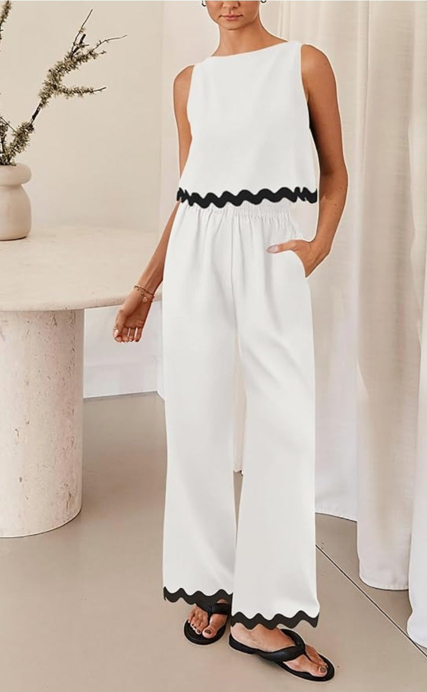 Dame trendy jumpsuit med bred ben og dekorativ bølgekant Stilla