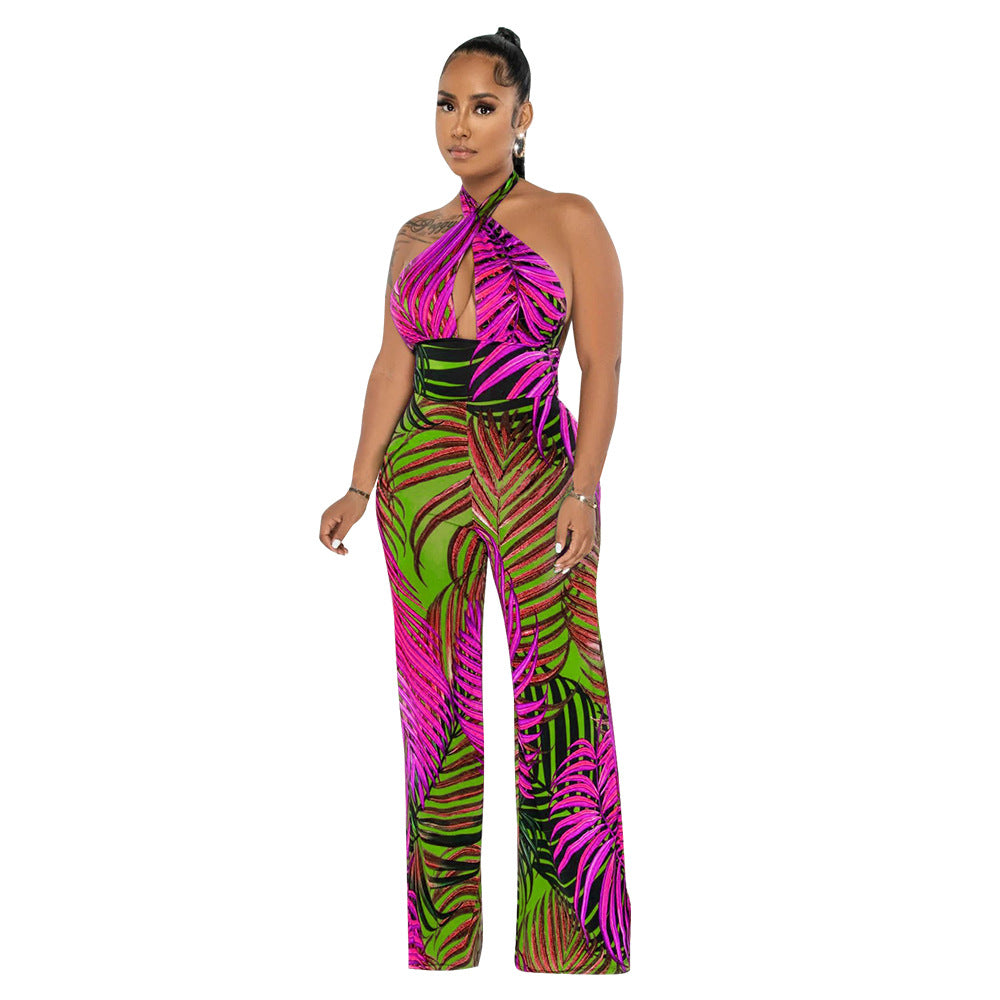 Dame elegant jumpsuit med afslappet halter-design og iøjnefaldende bladmønster Stilla