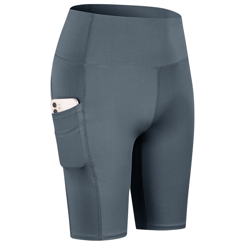 Dame Højskåret Sport-Cykelshorts med praktiske sidelommer og elastisk talje Stilla