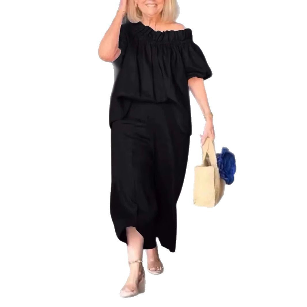 Dame luftig jumpsuit-sæt med voluminøse ærmer og raffineret taljering Stilla