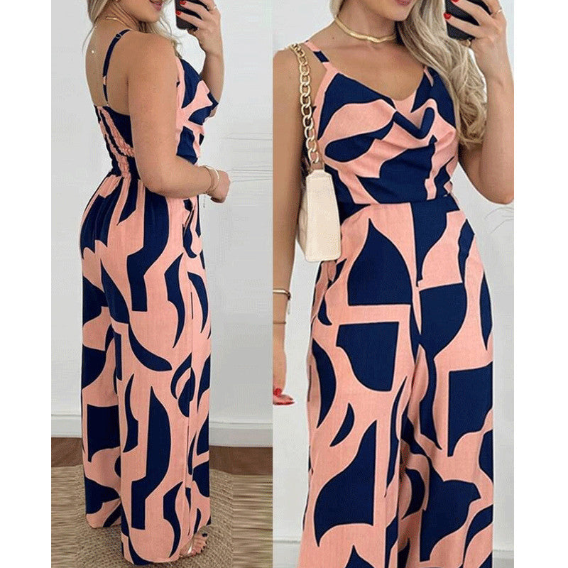 Dame jumpsuit med flydende snit og dekorative blomster motiver Stilla